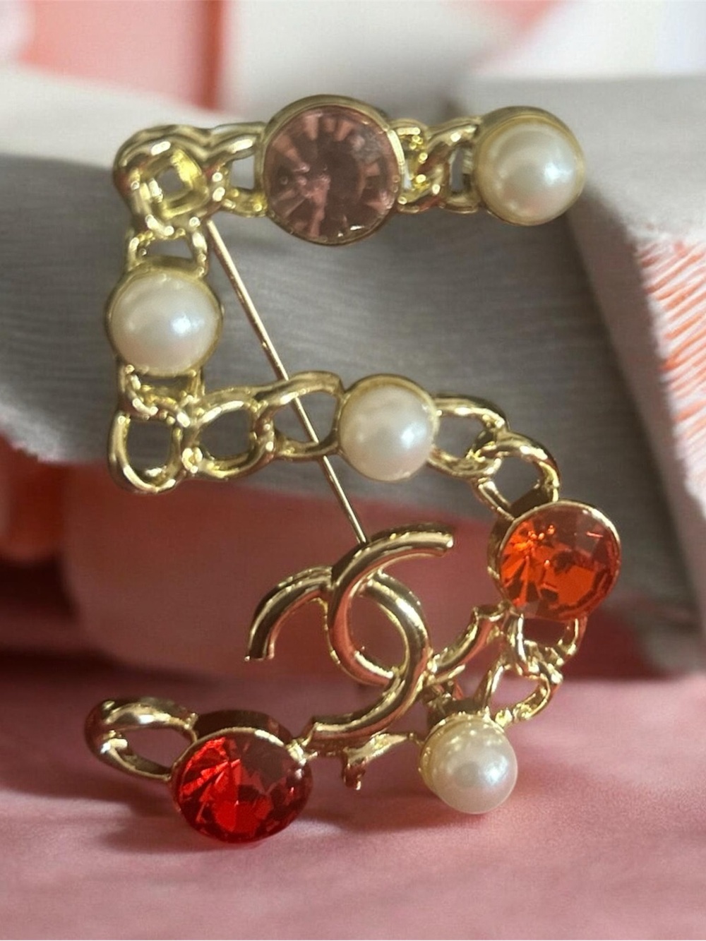 Gold-Tone Pearl & Crystal Logo Brooch — Pink, Orange, Red